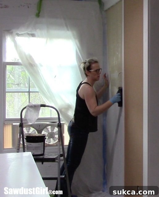 Applying Cork Adhesive to the Wall