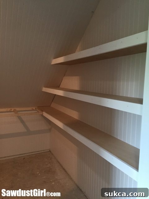 Building closet shelves in a craft room, featuring a wider back shelf