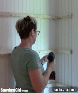 Installing a floating corner shelf cleat