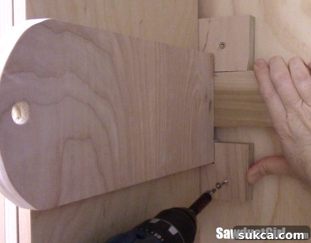 Adjustable brackets for rolling lumber cart