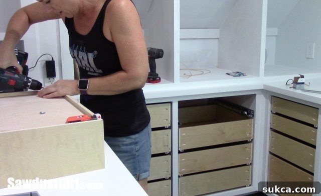 Endless Studio Drawers 9 Detailed view of drawer glide installation in progress