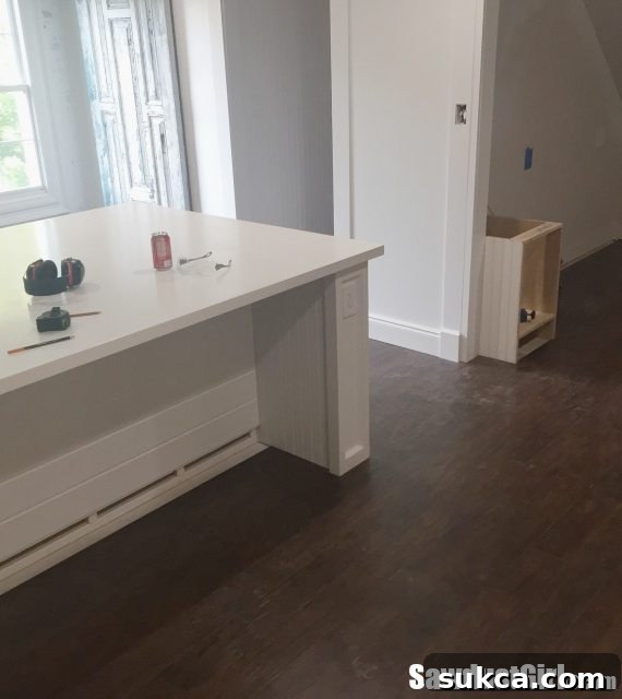 Pergo Laminate Flooring in Studio Detailed shot of newly installed Pergo laminate flooring, enhancing the studio's appeal