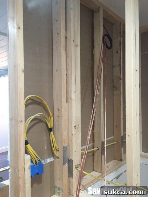 TV Wall Electrical Setup Electrical wiring and conduits expertly installed in the TV wall framework