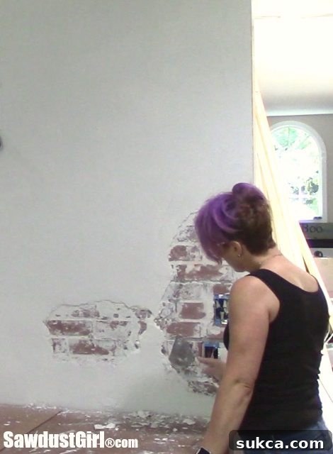 Chipping Away Thick Joint Compound Layers with a Trowel