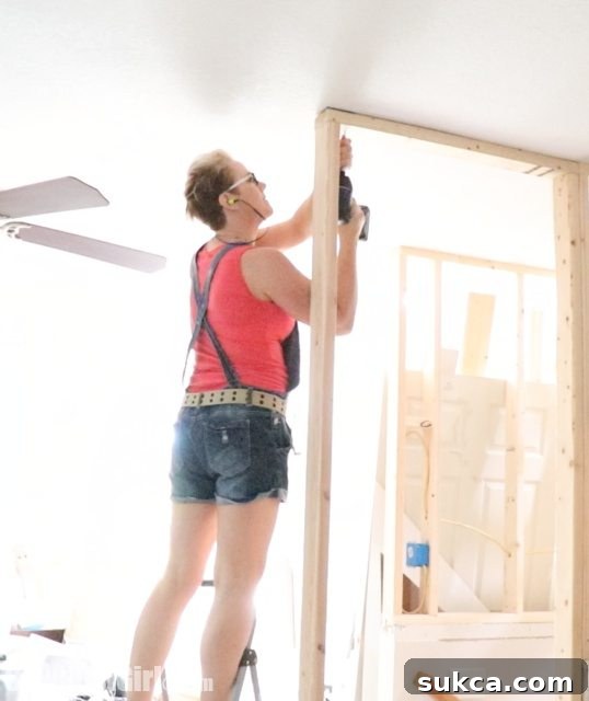 September's Home Journey 14 Loft Remodeling Update: Small Wall Framed Despite Clutter