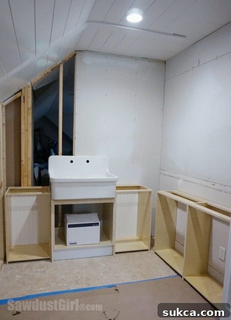 Craft Room Utility Sink Design Utility sink with a small countertop extension ready for customization