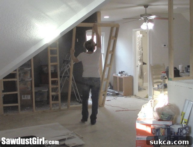 Building a craft room in the loft. - Walls from the former recording studio are being torn down to prepare for the craft room build.