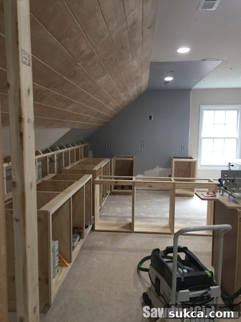 studio recap - The newly installed faux tongue and V-groove plank ceiling made from beveled plywood, adding unique architectural detail.
