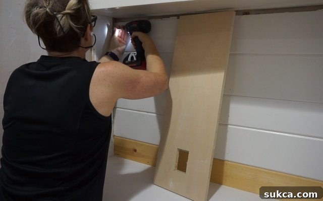 Hutch side supports Securing scrap wood for hutch side