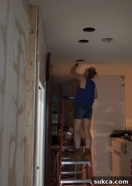 Cutting Access Holes for Wiring Recessed Lights