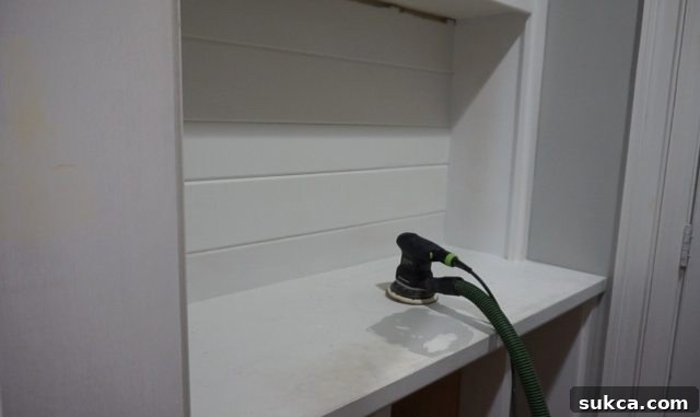 Sanding and Painting the Hutch for a Fresh Look