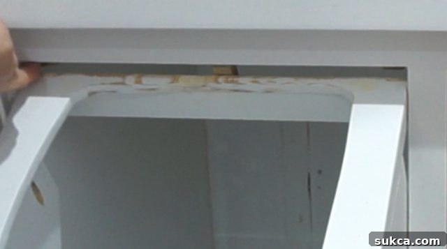 Tilt-out Storage Cabinet Swivel Stop Block Open