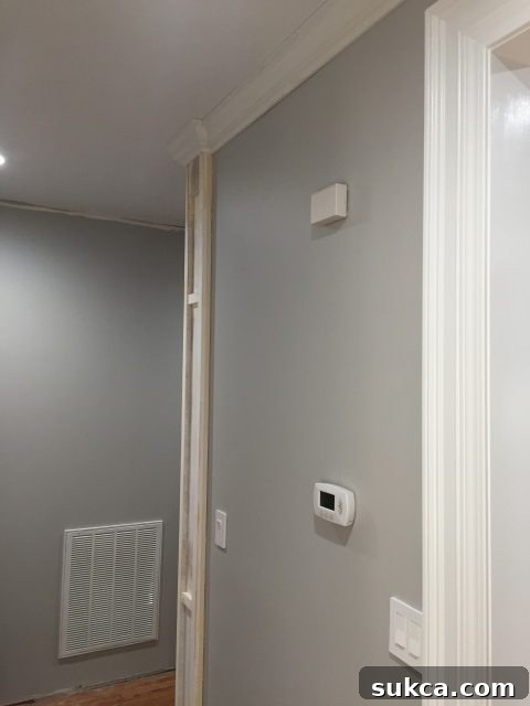Newly finished decorative column enhancing the hallway aesthetics