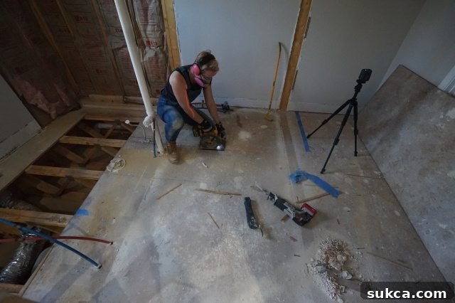 Subfloor Removal for Plumbing Access in Bathroom Renovation