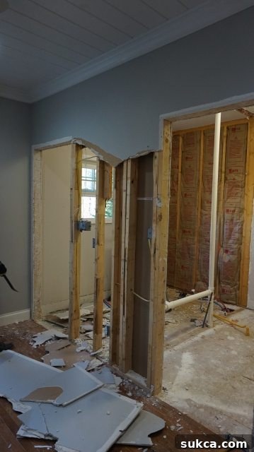 Family Helping with Sheetrock Removal