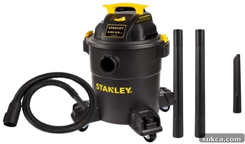 Robust wet-dry shop vac for spills and heavy debris