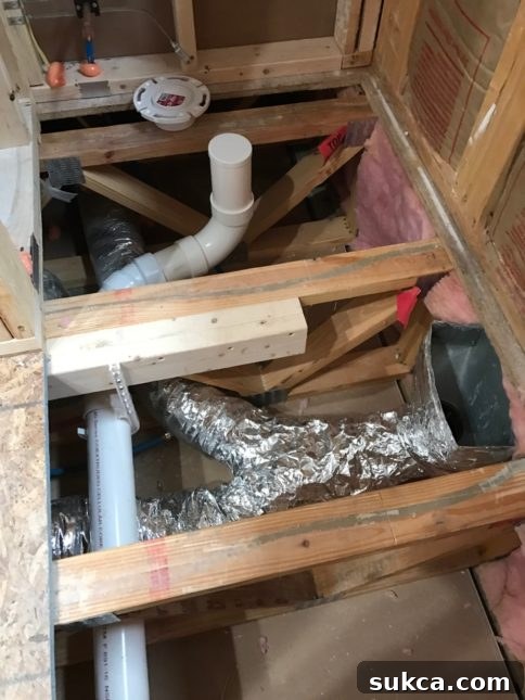 HVAC Toe-Kick Vent Ductwork Detailed view of HVAC duct connection for toe-kick vent under vanity