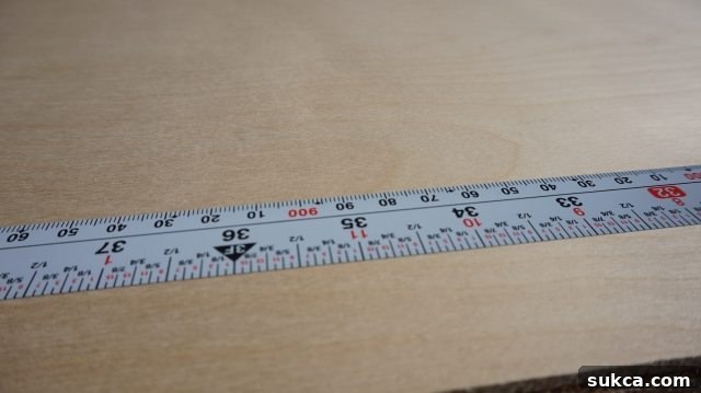 The Flatback measuring tape showing both imperial and metric scales. Flatback measuring tape