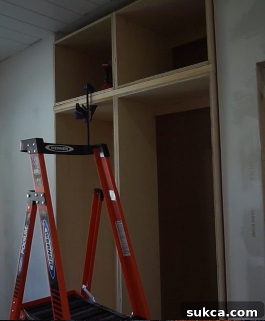 Custom Built-in Wardrobe and Linen Cabinet Construction Progress on custom bedroom wardrobe cabinets and linen storage