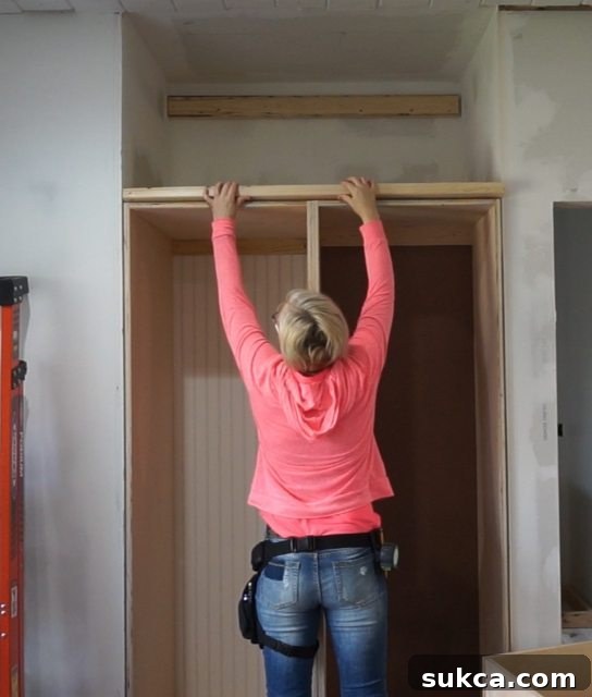 2x4 Blocking for Faceframe and Ladder Support Installing 2x4s between upper and lower cabinets for a chunky faceframe and ladder support