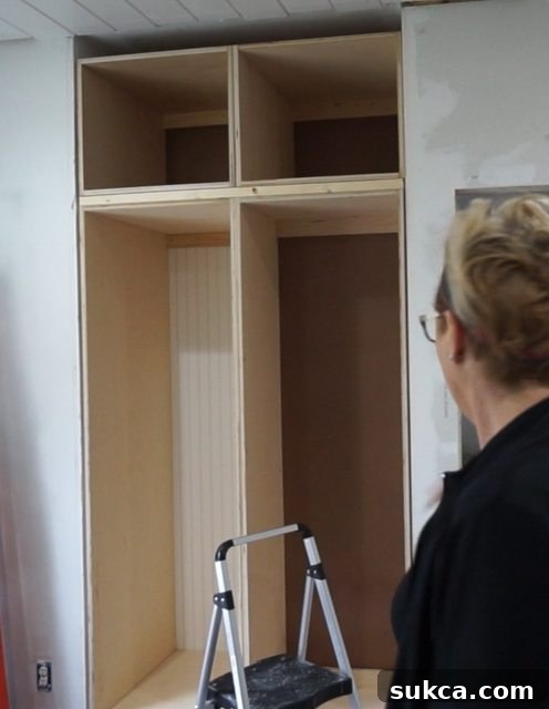 Secure Installation of Upper Wardrobe Cabinets Securing upper wardrobe cabinets to each other, lower cabinets, and the back wall