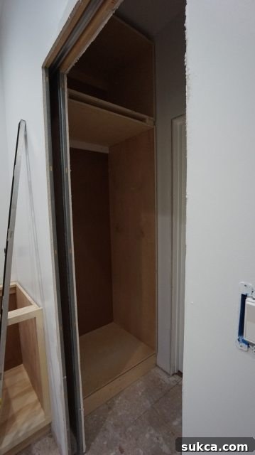 Wardrobe cabinets fully secured to each other and to the wall studs