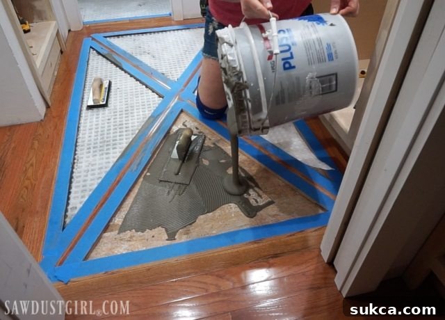 Wood floor with brick tile inlay protection Taping Off Hardwood Floor Before Tile Inlay Installation