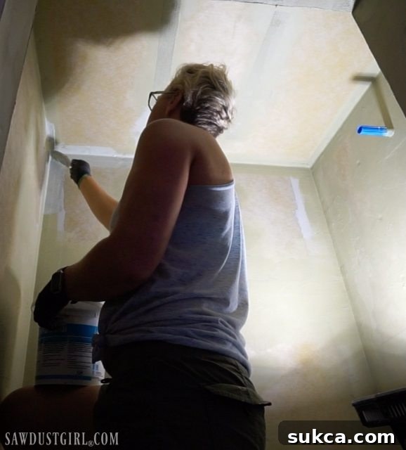 Liquid Waterproofing Membrane Application Applying the HYDRO BAN liquid waterproofing membrane to shower walls.