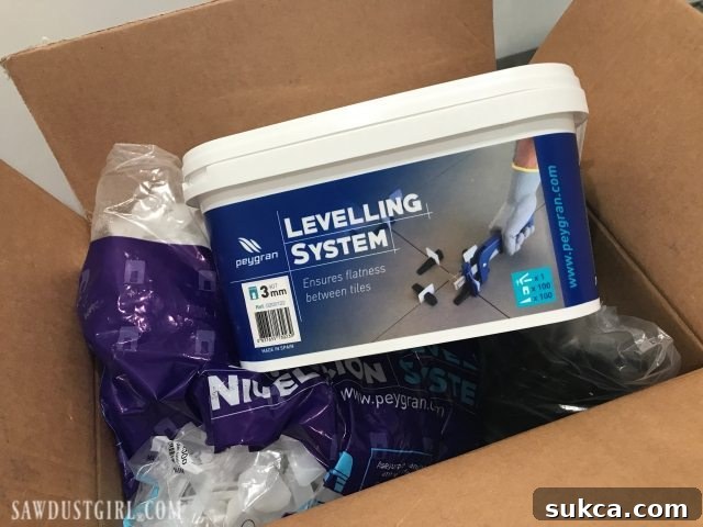 Utilizing Leveling Spacers for Flawless Tile Installation Tiling the Shower: Demonstrating the use of leveling spacers to prevent lippage with large format tiles.