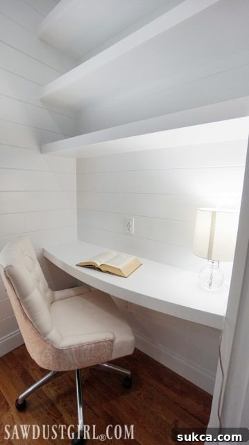 Stunning curved floating desktop built into a wall niche, showcasing smart space utilization and elegant design