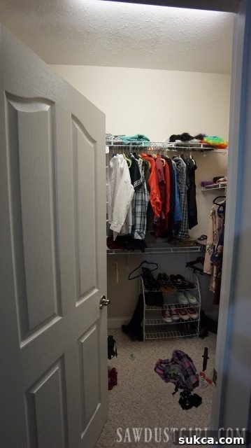 Water leaking from a light fixture in a basement closet