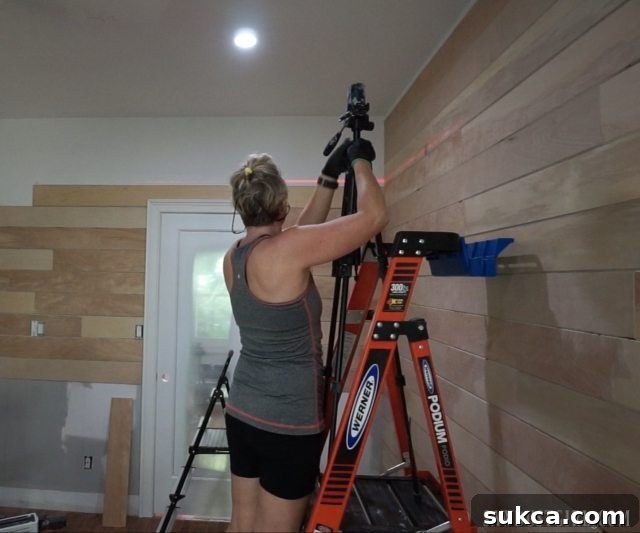 Installing Shiplap Planks with Laser Level Using a laser level to install shiplap planks