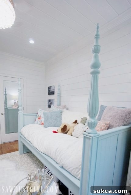 Stunning finished upcycled daybed in a beautifully styled small bedroom