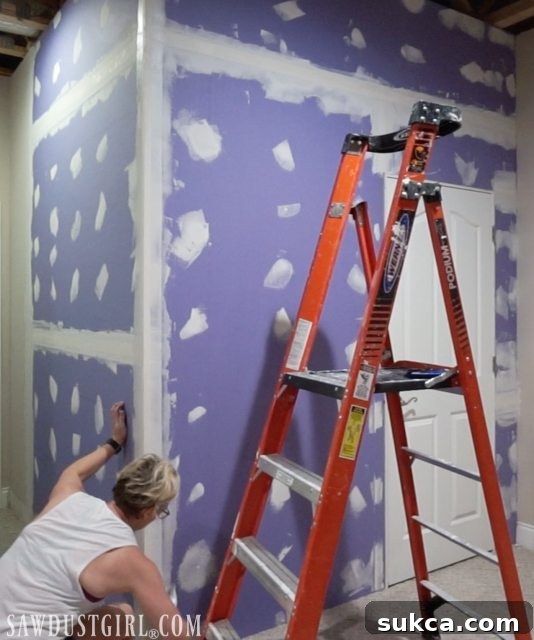 Close-up of smooth mudding application on drywall
