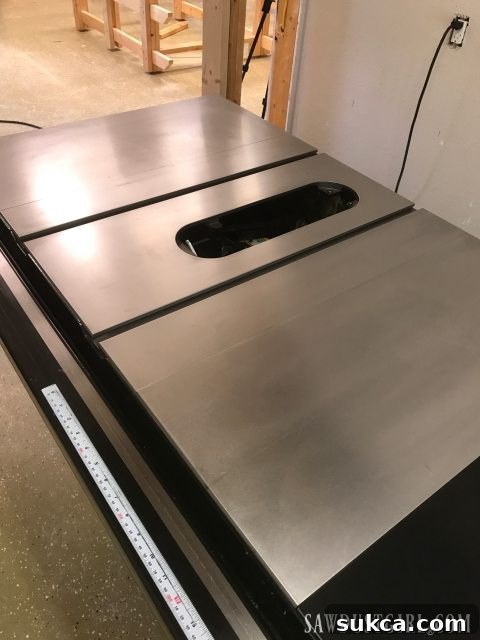 Close-up of a power tool surface after successful rust removal, showing a clean, restored finish