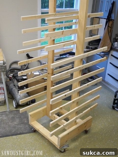 Freshly painted cabinet doors drying on a DIY rack