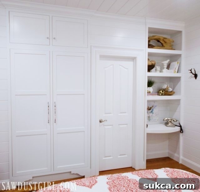 Integrated Storage for Compact Bedrooms 11 The fully completed built-in tiny closet in a small bedroom, offering optimized storage.