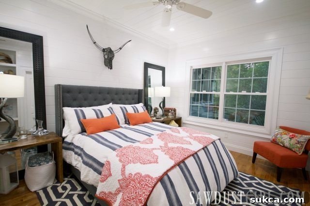 A captivating glimpse into the newly remodeled guest bedroom, showcasing thoughtful design and elegant decor.