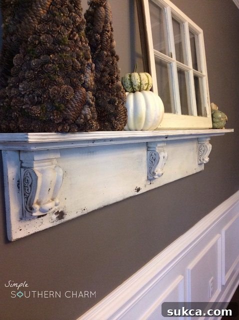 Beautifully crafted wooden DIY mantel shelf, showcasing a perfect blend of rustic and elegant home decor, inspired by Simple Southern Charm's detailed tutorial.