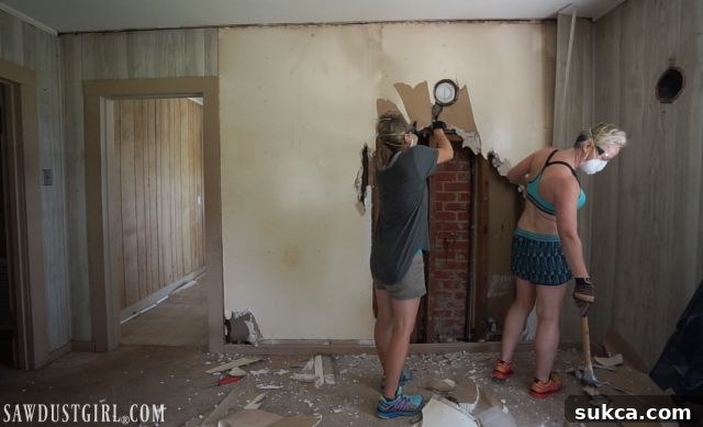 Calderwood Cottage Demo Days! Revealing hidden structures behind walls, including a partially removed chimney.