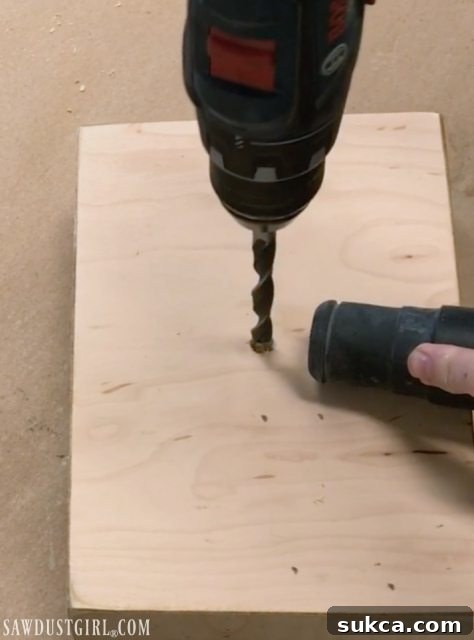 Krazy Glue for Stability Applying Krazy Glue to Insert Nut