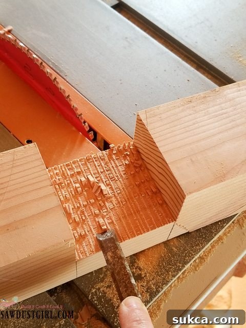 Chiseling Half-Lap Joint Smoothing the half-lap joint with a chisel for a clean finish