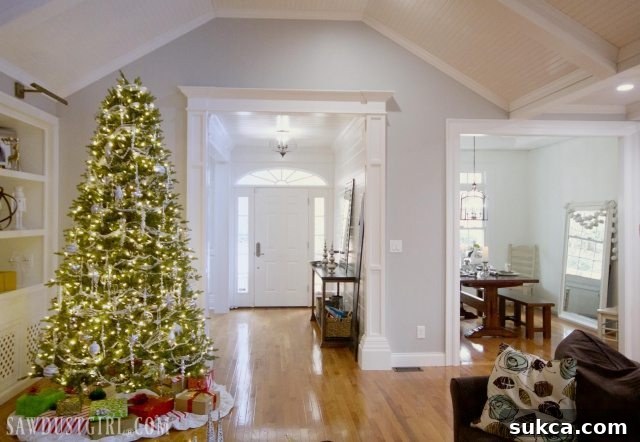 Beautifully decorated Christmas tree illuminated, creating a warm and festive ambiance.