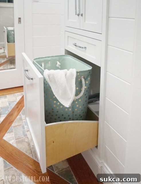 Sleek Arc Laundry Glide 22 Bathroom linen closet with pull out hamper