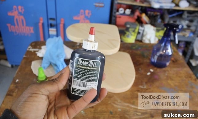 Variety of store-bought wood dyes: Transfast powders (Grey, Blue, Extra Dark Walnut) and Transtint liquid concentrate (Dark Mission Brown) for woodworking projects