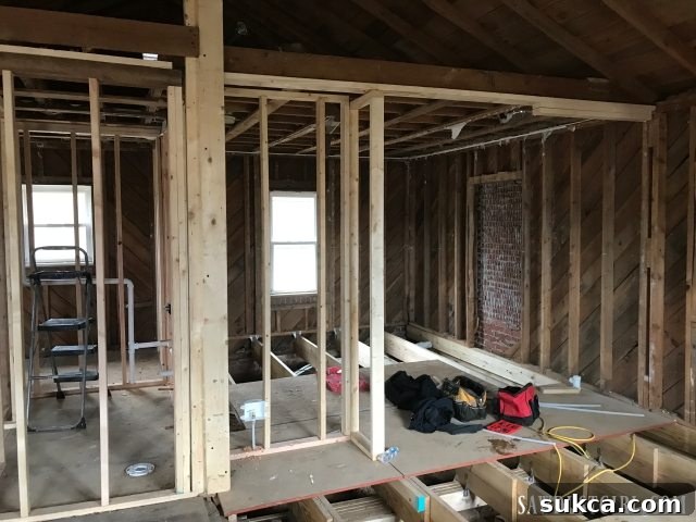 Preparing for master bedroom wall construction Strategic subfloor placement for master bedroom wall