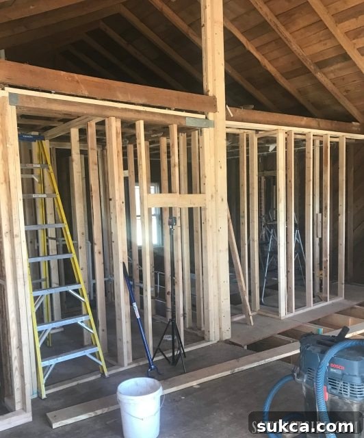 Optimal placement of the master bedroom entrance Framing the master bedroom wall with new doorway