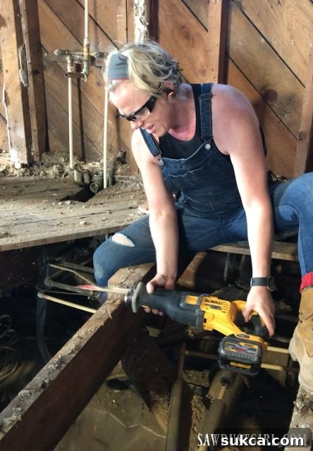Efficient nail removal technique during renovation Cutting stubborn subfloor nails with a reciprocating saw