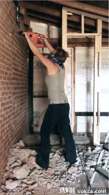 Cutting Mortar Lines with a Rotary Hammer Calderwood Cottage breaking brick wall