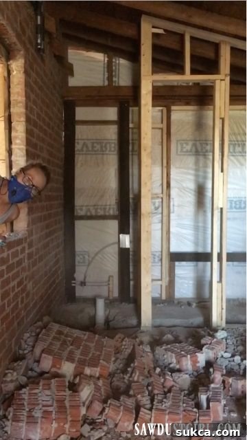 Demolishing the Bricked-Over Window Calderwood Cottage brick wall demolition